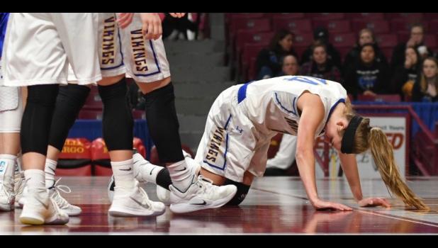 Photo for the Mascot by Sue Jacobson. Abby Hennen left everything she had on the floor.