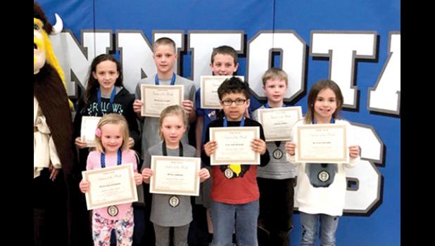Special photo. Elementary winners are: (front row, left to right) Raya MacKinnon, Etta Larson, Colton Bitker, and Aliyah Myhre. Back: Lyzah Sussner, Ryan Meagher, Garrett Peterson and Jason Verly.