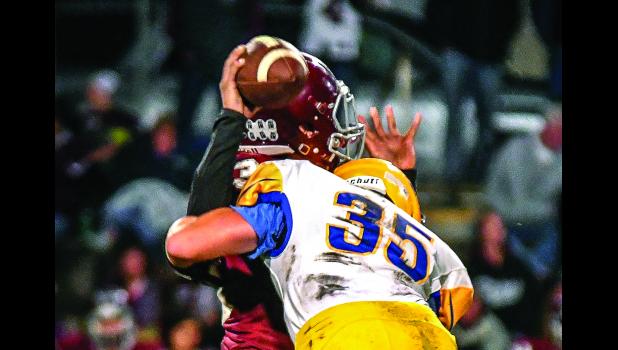 Photo for the Mascot by Brian Jeremiason Austin Sorenson zoned in the YME quarterback.