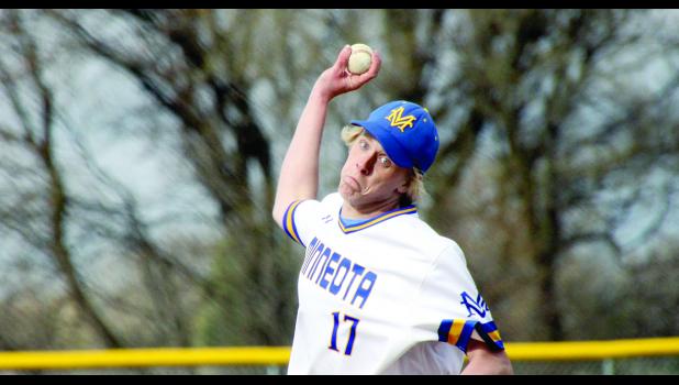 Staff Photo by Byron Higgin. Austin Sorensen strained to throw.