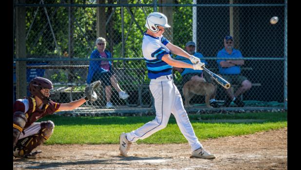 Photo for the Mascot by Brian Jeremiason. AJ Myhre belts the first of his two home runs hit against Wabasso on Monday, but Minneota lost 11-4 at K.P. Kompelien Field.