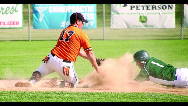 By Byron Higgin, Mascot Sports Editor Minneota's Beau Buysse slid into second base safely against Dumont's Mike Kill. Buysse stole the base in the first inning.