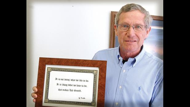 Staff photo by Scott Thoma. Berdette Schoep, who started the business, holds a motto he has lived.