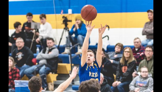 Photo for the Mascot by Brian Jeremiason. Cale Sorensen led the Vikings with 21 points.