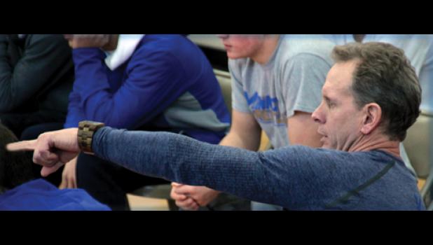 Staff photo by Byron Higgin. Coach Joel Skillings pointed to one of the unusual situations.