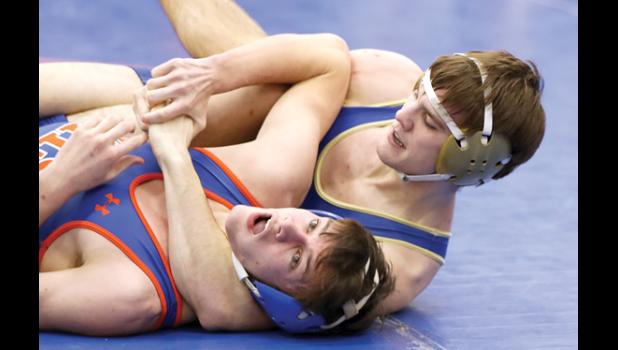File photo. Cole VanOverbeke, No. 4 at 152, notched a pin, a major decision and a forfeit in his three matches.
