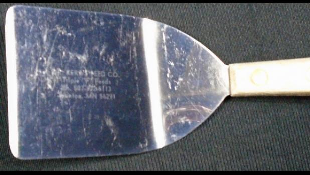 Photo Courtesy of the Lyon County Museum. This spatula is engraved with “Dr. Kerr’s Feed Co. Triple “F” Feeds Ph: 507-872-6113 Taunton, MN. 56291” on the blade.