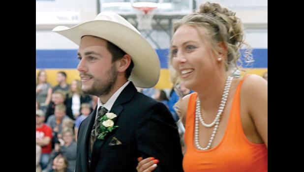 Staff Photo by Byron Higgin You don’t have to be traditional and clad in his cowboy hat was Adrian Laleman. He and his date Jordan Moorse seemed to be enjoying the event.