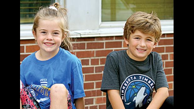 Photo for the Mascot by Sue Jacobson. Crown Bearers Taryn Myrvik and Dax Anderson.