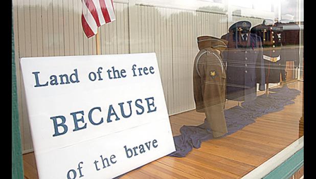 Staff Photo by Byron Higgin. A great window display just in time for Memorial Day.