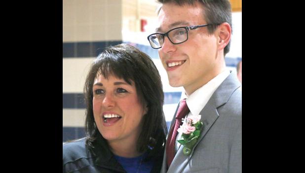 Staff Photo by Cherri Schmig. There is always time for photos and Donnie Schuelke paused for one with his mom, Julie Schuelke.