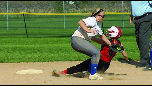 Photo for the Mascot by Sue Jacobson Emily Pohlen took the throw and tagged the Redwood runner during the 9-4 win on Thursday.