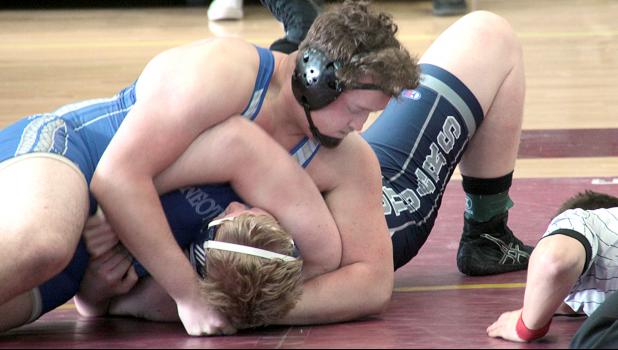 Staff Photo by Byron Higgin. TJ Esping gets his 91st pin to set a new Minneota record.