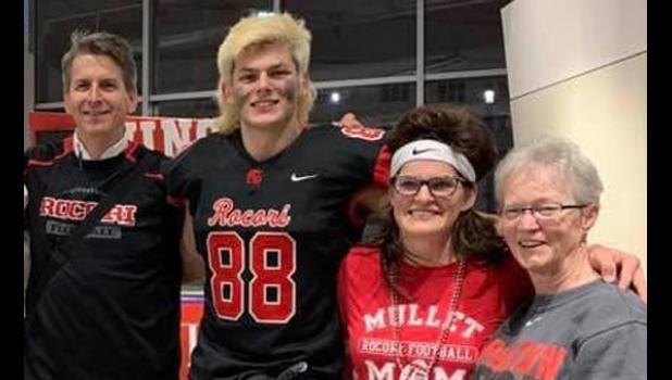 Special photo. The family at the game included Andrew’s father Ken, his mother Kim and grandmother Darlene LeGare. They were a happy group after Andrew’s heroics.