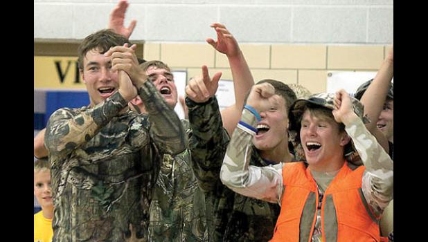 Special photo for the Mascot by Brian Jeremiason. Leading the cheering against Canby Tuesday were: (left to right) Isaac Hennen, Nolan Boerboom, Cole Sanow and Brant Buysse.