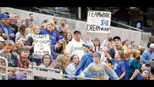 Photo for the Mascot by Brian Jeremiason. The Abraham family was out in force to support their favorite son, Landon Abraham (No. 5), but also the idea that “Teamwork Makes the Dream Work.”