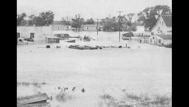 Special photo. There may be a lot of water in the area this year, but back in 1957 the Merritt farm was flooded in the summertime. There was also flooding on North Jefferson Street between Second and Third Streets in Minneota that same year.