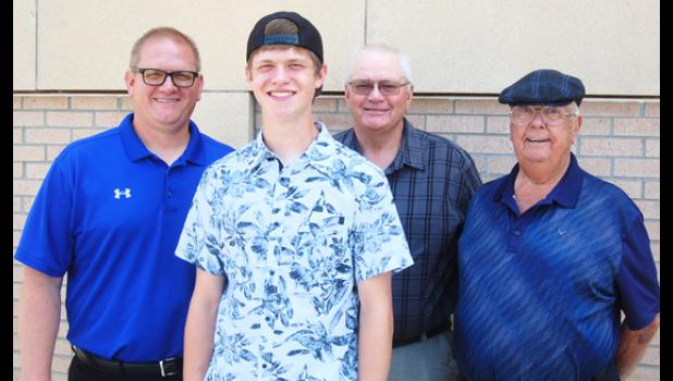 Mascot photo by Scott Thoma AJ Myhre, front, is a fifth family tree generation graduate of Minneota High School. Left to right is his father, Jason Myhre, his grandfather Jim Myhre and his great-grandfather Jim DeCock. Also, DeCock's late mother, Lillian Haugejorde, graduated from Minneota in 1931.