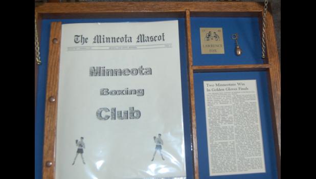 Mascot photo by Scott Thoma The shadow box Randy Fox put together of his father's boxing medal and newspaper clippings from his days as a Minneota featherweight boxer.