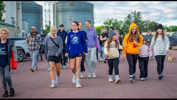 Runners and walkers of all ages start out on the Family Fun Run last year. 