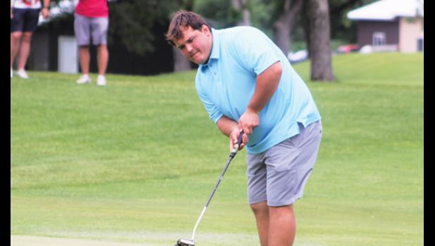 Mascot photo by Scott Thoma Jackson Esping sinks a 10-foot putt on No. 17 on Wednesday in Becker.