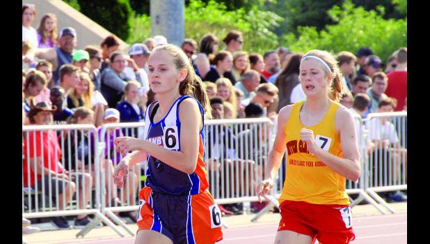 Staff Photo by Byron Higgin Grace Drietz runs in the 800-meter run at the state.