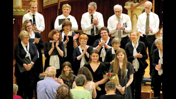 Special photo. Emma Lipinski received a special thank you from the rest of the chorale during the event last week.