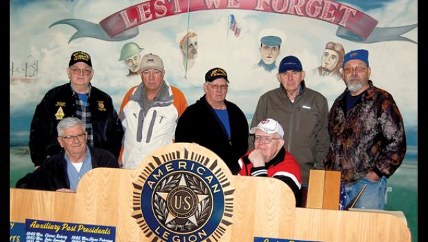 Staff photo by Scott Thoma. Veterans in the meeting room at the American Legion include: (front row, left to right) Leon Kack and Byron Higgin. Back Row: Tom Hovland, Harold DeSmet, Ed Lozinski, Gary Buysse and Jim Fink.