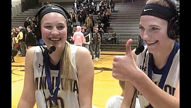 Special Photo by Q-92 Radio. The Hennen sisters, interviewing on Q-92 Radio from Madison during the sectionals, have been named captains for the next year. They are: Morgan (left) and Abby (right).