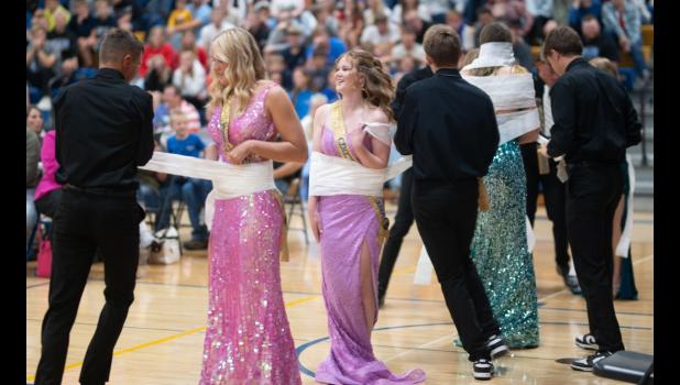 Minneota celebrated Homecoming Week Sept. 14-18 with daily themed events and activities. Among the activities following the coronation was the candidates playing a “Mummy Wrapping” race (above right). 