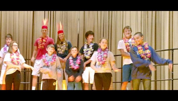 Photo for the Mascot by Allison Peterson. Kids at St. Edward School presented their Spring Concert last week. Junior high kids tried their hand at the Hula Dance.