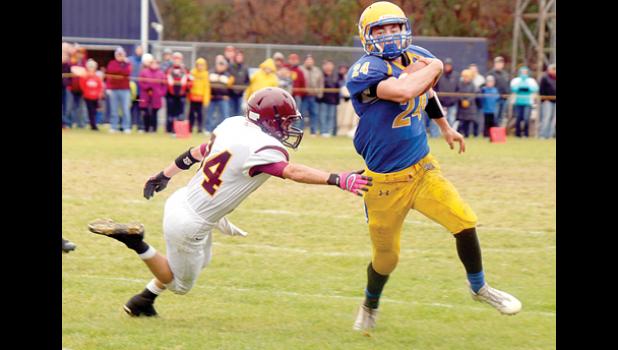 File Photo by Byron Higgin. Isaac Hennen (24) will take 2,180 yards rushing last year into his senior season. He will depended on to run the ball, catch it, block, play safety as well as linebacker on defense and lead his team as a captain. Hennen was a crucial part of the 36-game winning streak and was instrumental in the state championship win over Minneapolis North two seasons ago.
