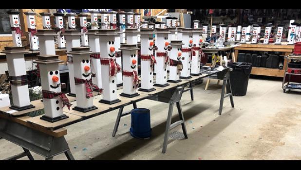 Contributed photo Kevin Jerzak made 57 of these snowmen and gave them to businesses in town to brighten people's holiday season.