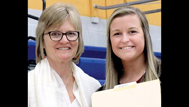 Staff Photo by Byron Higgin. The Emily Ufkin Memorial Scholarship was given by Alison Ufkin in her daughter’s memory to Jennifer Krog.