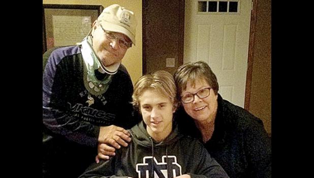 Special photo. Landon and his grandparents, Jim and Becky Rolbiecki.