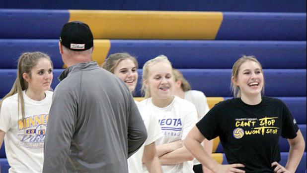 Staff Photo by Byron Higgin. Sharing a lighter moment in practice as they prepare for Saturday’s opener are members of the Minneota Vikings girls’ basketball team. Assistant Coach Dale Kockelman appeared in front of (left to right) Natalee Rolbiecki, Abby Hennen, Abby Rost and Morgan Hennen, who sported a “Can’t stop, won’t stop,” volleyball T-shirt. All four were members of the state championship volleyball team. And all four are likely to start on Saturday.