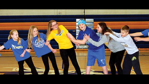 Staff Photo by Cherri Schmig. Fifth Graders were all pulling to show how bullying needs to change.