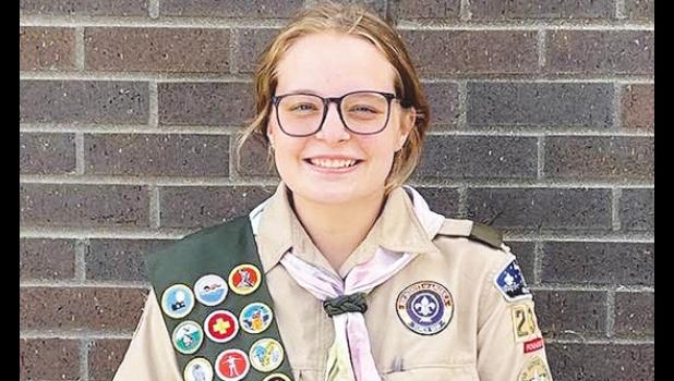 Contributed photo Kaitlyn Ludwikowski displays the 25 merit badges she earned en route to achieving Eagle Scout status.