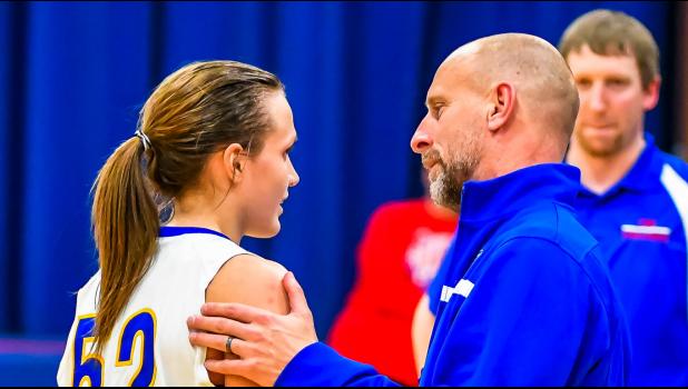 Photo for the Mascot by Brian Jeremiason. Lydia was congratulated by Coach Chad Johnston.