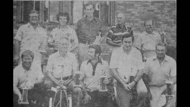 The winners of the 1976 Countryside Golf Club tournament. Standing, left to right: Wynston Boe, championship flight winner; Mike O’Reilly, championship flight runner-up; Slim Klein, first flight winner; Andy Traen, second flight winner; Dr. W.W. Merritt, third flight winner. Front row, left to right: Norm Myer, fourth flight winner; Virgil Ufkin, fifth flight; Bernie Wambeke, sixth flight; Don Tomasek, seventh flight; and Leonard Richards, eighth flight.