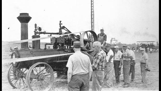 Contributed photo Members of the Minneota Rotary Club participated in a threshing bee at Virgil Thompson’s farm in this 1965-71 photo.
