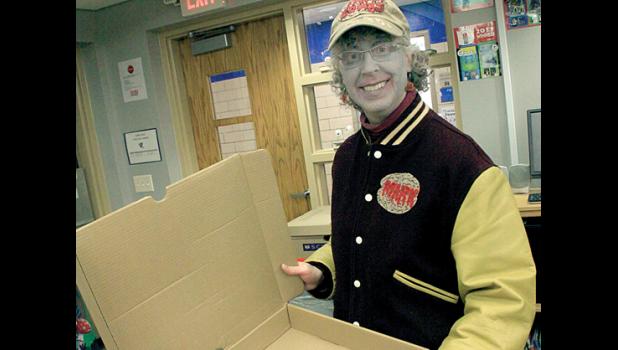 Staff Photo by Byron Higgin. School Librarian Nancy Dilley was a “Goulish” delivery boy.