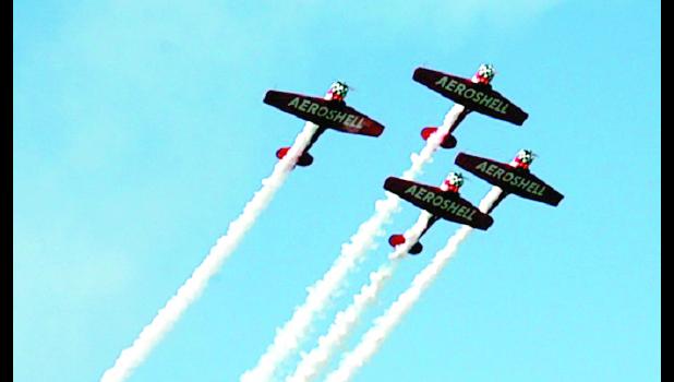 Staff photo by Scott Thoma. Planes on parade at the air show.