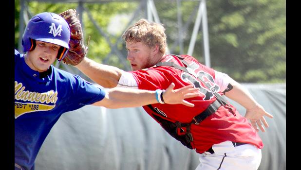 Staff Photo by Byron Higgin. Alex Pohlen (left), danced around Cottonwood catcher Seth Poltz to score a run in the first inning.