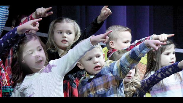 Staff photo by Byron Higgin. Kindergartners performed Holly Jolly Christmas.