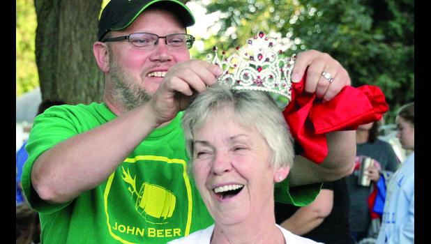Staff Photo by Byron Higgin When Charlie Anderson put the crown on the head of Barb Hurt, it officially kicked off the Porter Festival Friday night.