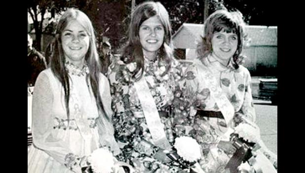 Special Photo. Queen attendants prior to riding in the Homecoming parade, from left, Mary Jo Boulton, Heidi Johnson and Sheree Boe.