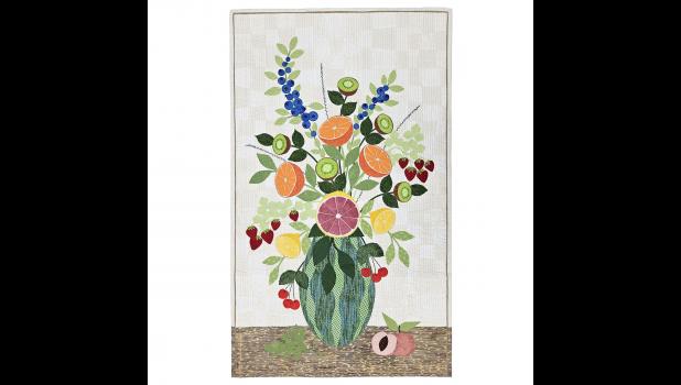 Contributed photo “Summer Bounty”, a quilt made by Cheryl Guacci, hung in the Visions Museum in San Diego.