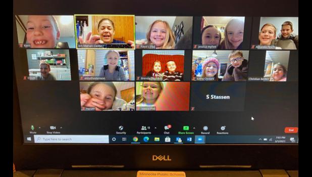 Contributed photo The thumbnails of some of the Minneota elementary students listening to their principal reading a book on Monday night.