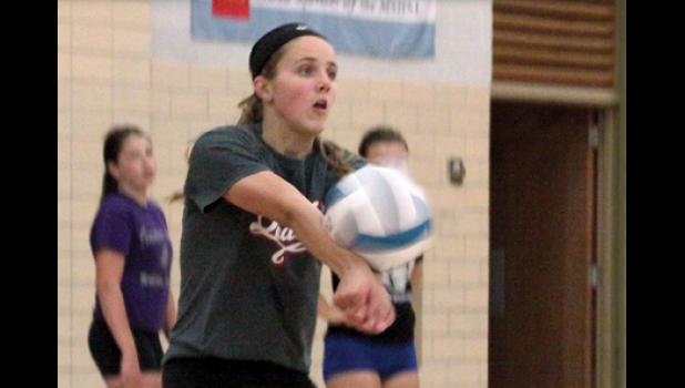Staff Photo by Byron Higgin. Youngsters like Natalie Rolbiecki are getting varsity experience at a young age. But the preparation they get by playing Junior Olympic volleyball in the summer gives them a jump up on competition that hasn’t prepared so vigorously.